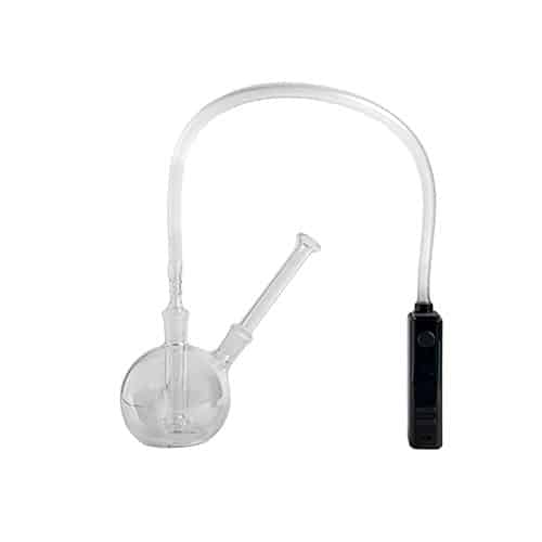 Whip bubbler attached to vaporizer on table
