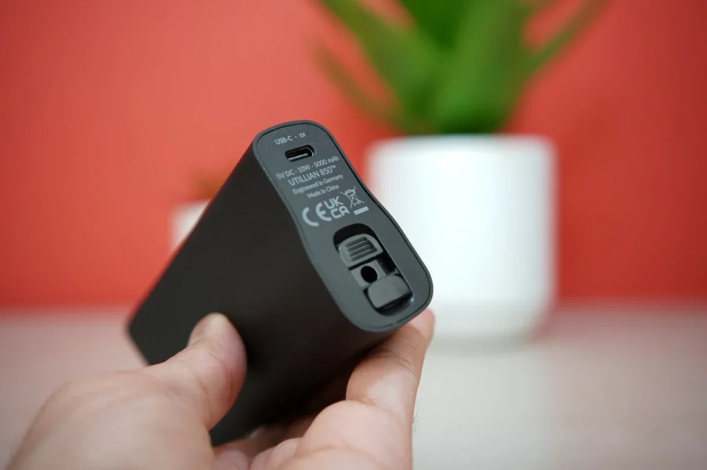 Bottom view of Utillian 850 showing USB C charging port and technical specifications