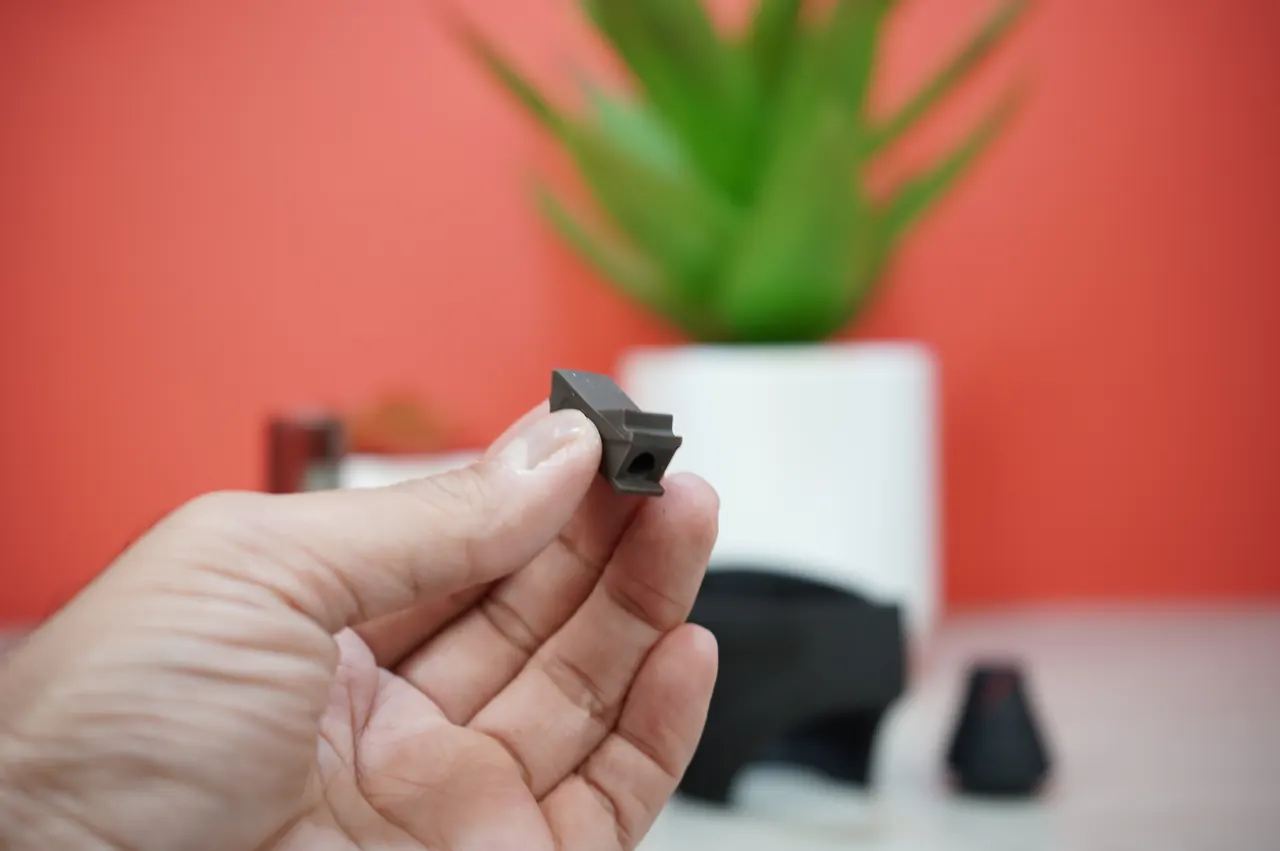 Utillian 8 Turbo small silicone replacement part close up in hand